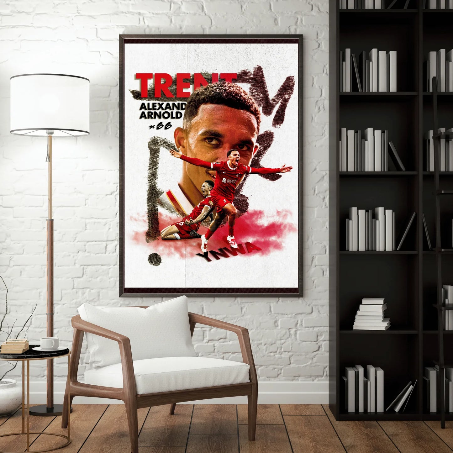 Framed football art of Trent Alexander-Arnold hung on a modern living room wall beside a bookshelf and chair.