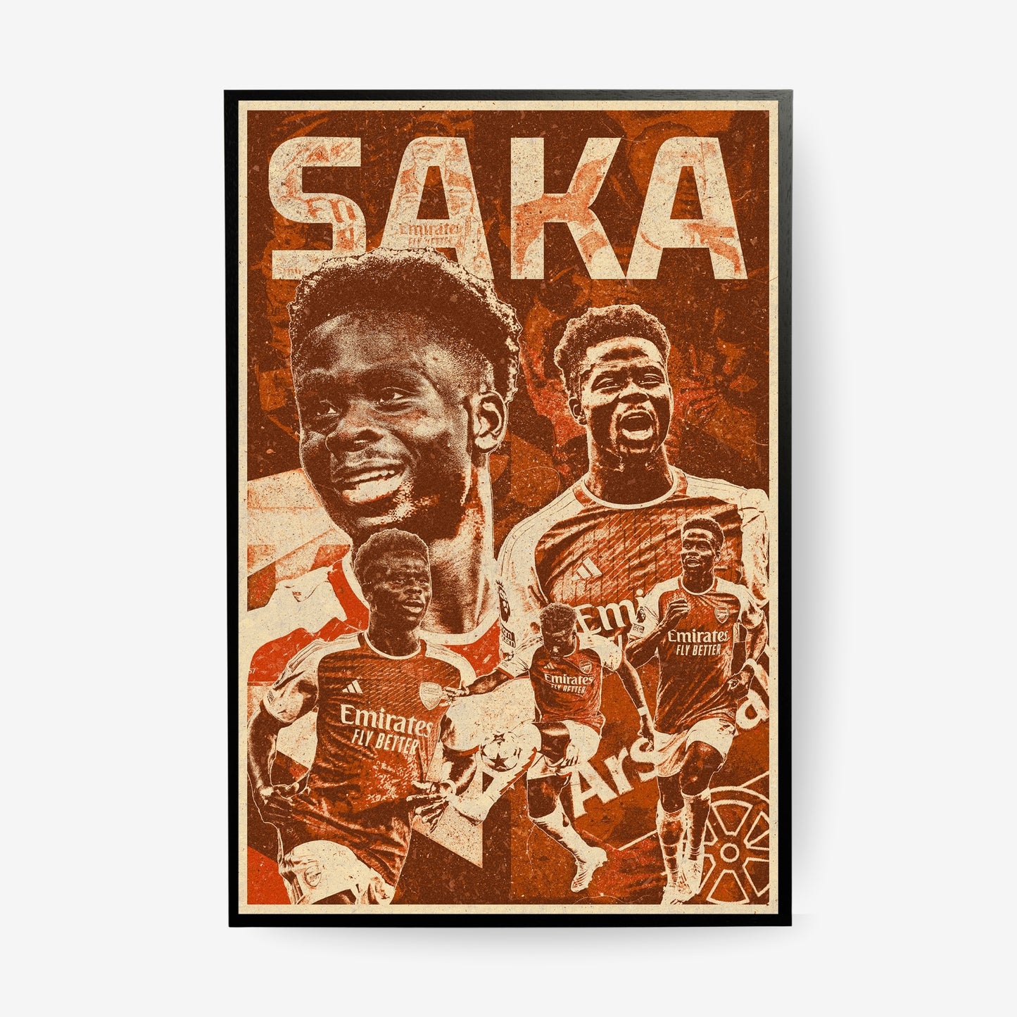 Bukayo Saka Arsenal poster in a black frame featuring a vintage red football collage