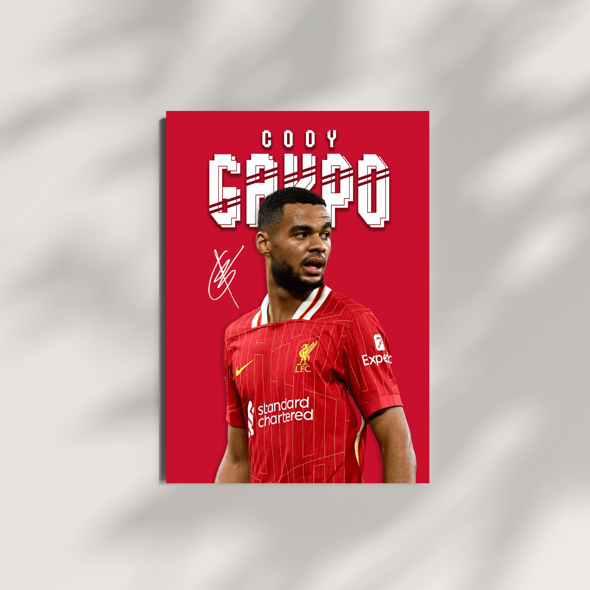 Soccer player in a red jersey with 'Cody Grupe' text on a red background