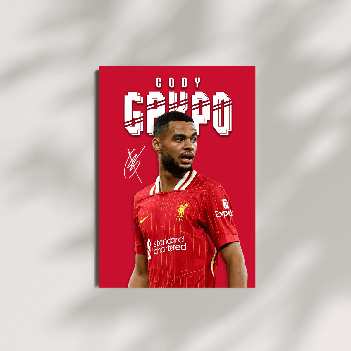 Soccer player in a red jersey with 'Cody Grupe' text on a red background