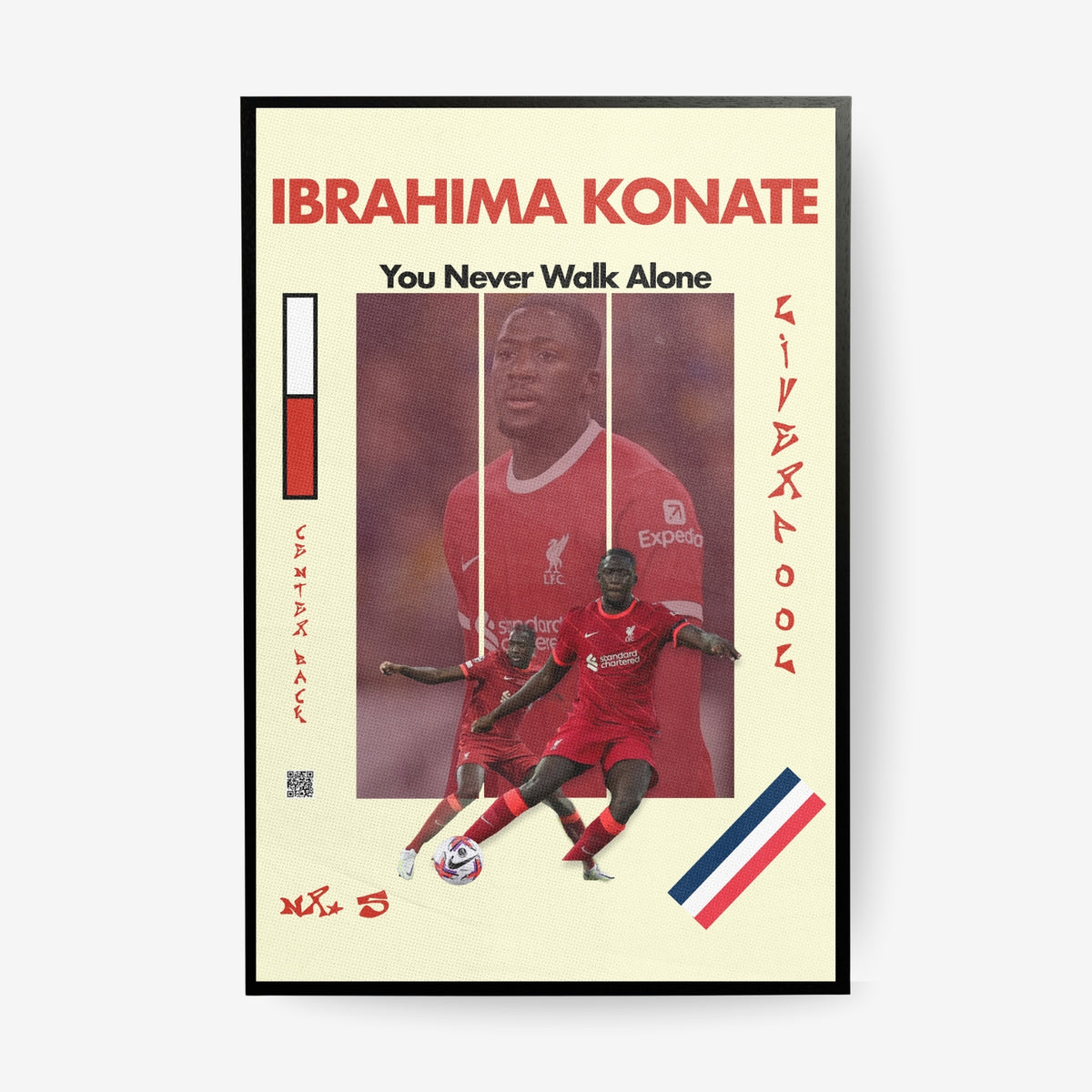 Ibrahima Konate football poster in a black frame featuring Liverpool inspired red artwork
