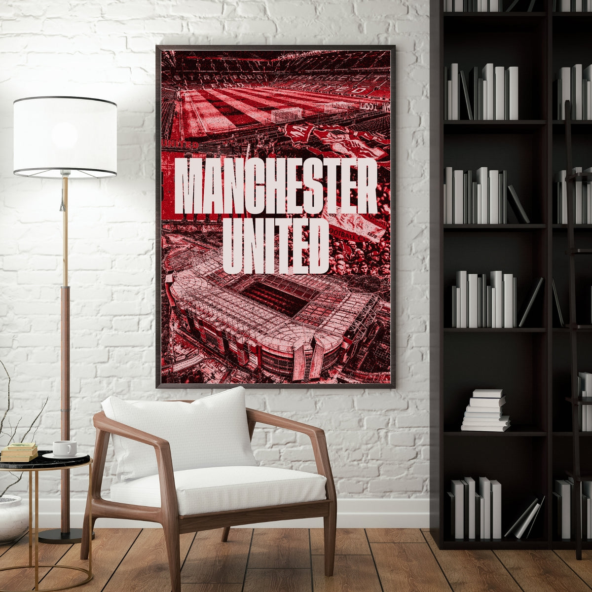 Manchester United Old Trafford poster displayed in a modern interior with a dark frame
