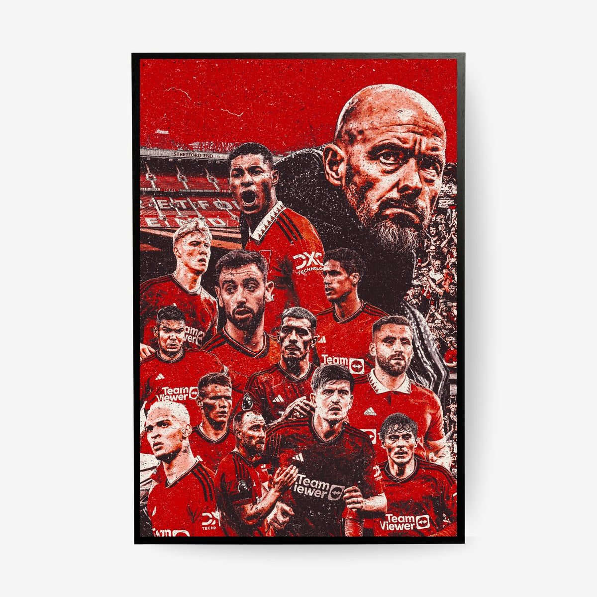Manchester United squad poster in a black frame featuring players and manager in a red collage design