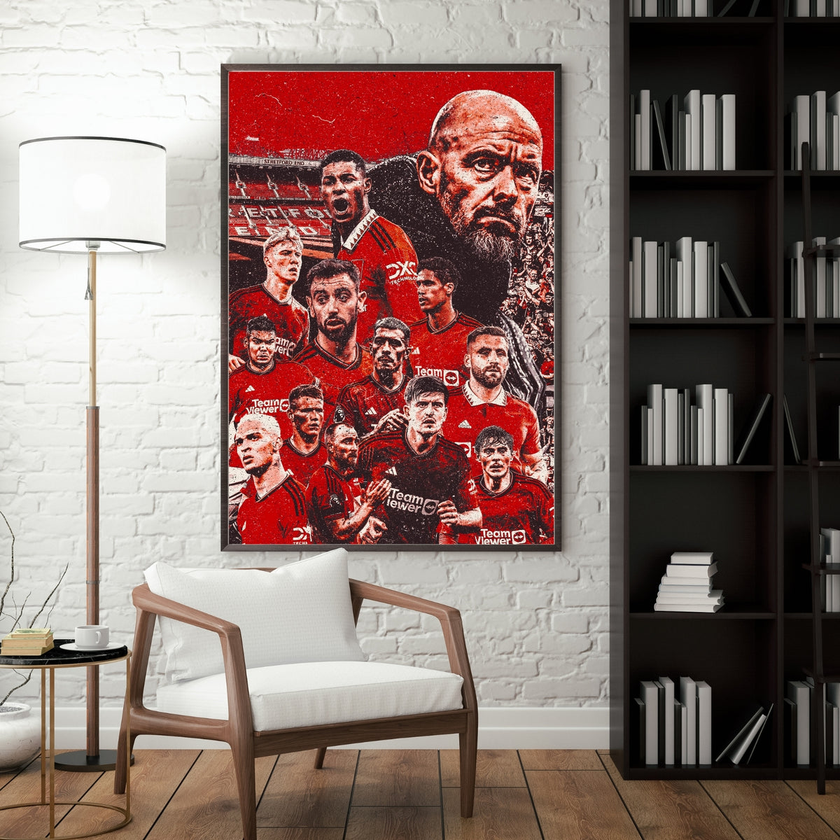 Manchester United squad poster displayed in a modern interior with a dark frame