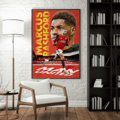 Framed poster of a soccer player with 'Man United' branding in a room with a white brick wall, chair, and bookshelf.