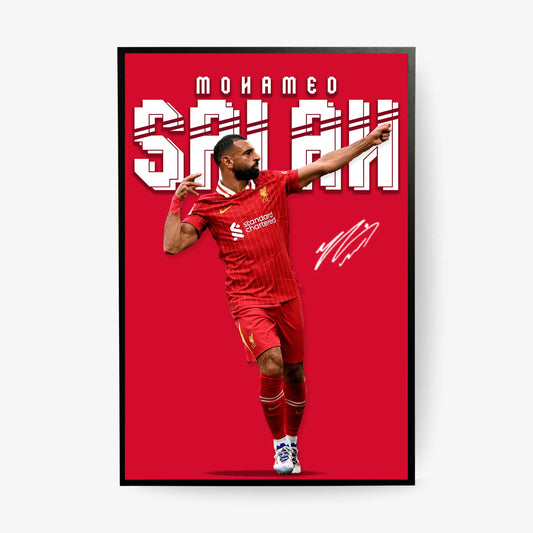 Framed poster of a soccer player in red uniform with 'Mohamed Salah' text on a red background.