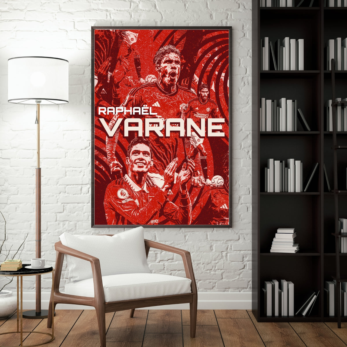 Raphaël Varane Manchester United football poster displayed in a modern interior with a dark frame