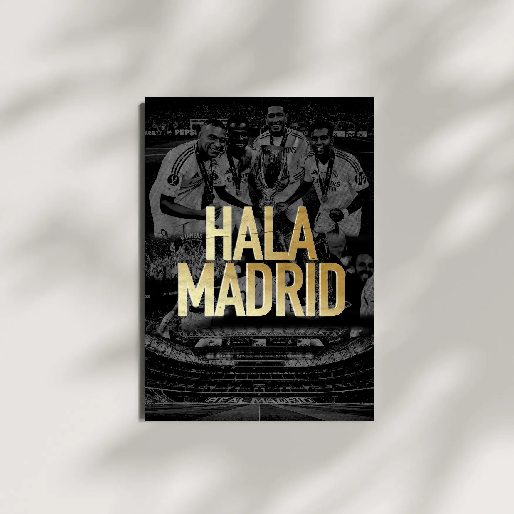Poster with soccer players and 'Hala Madrid' text on a dark background