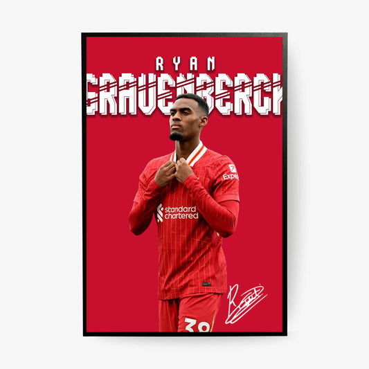 Framed poster of a soccer player in a red uniform with 'Ryan' and 'Grauebergh' text on a red background.