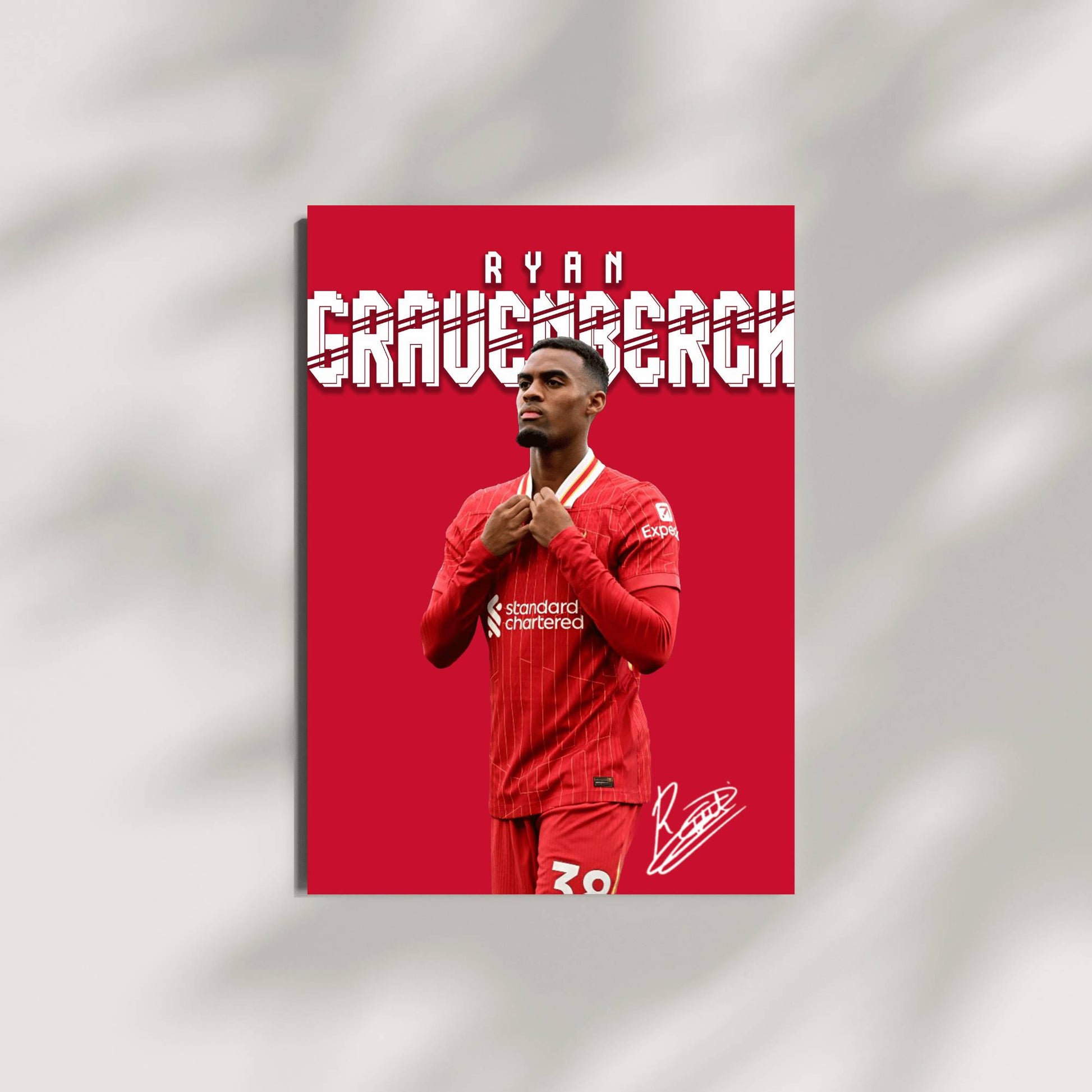 Soccer player in red uniform with 'Ryan Grauengger' text on a red background