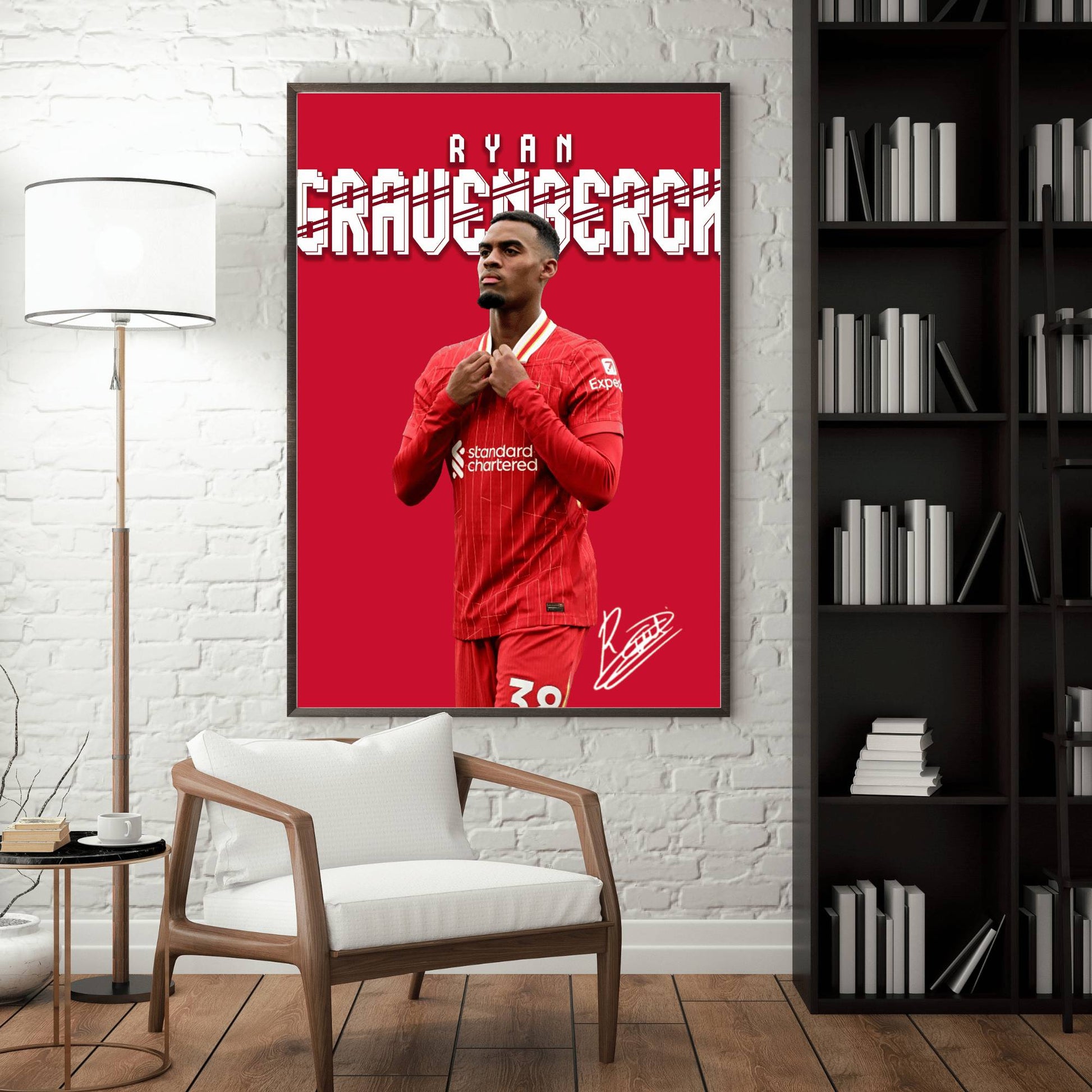Framed poster of a soccer player in a red jersey on a wall in a room with a chair and bookshelf.