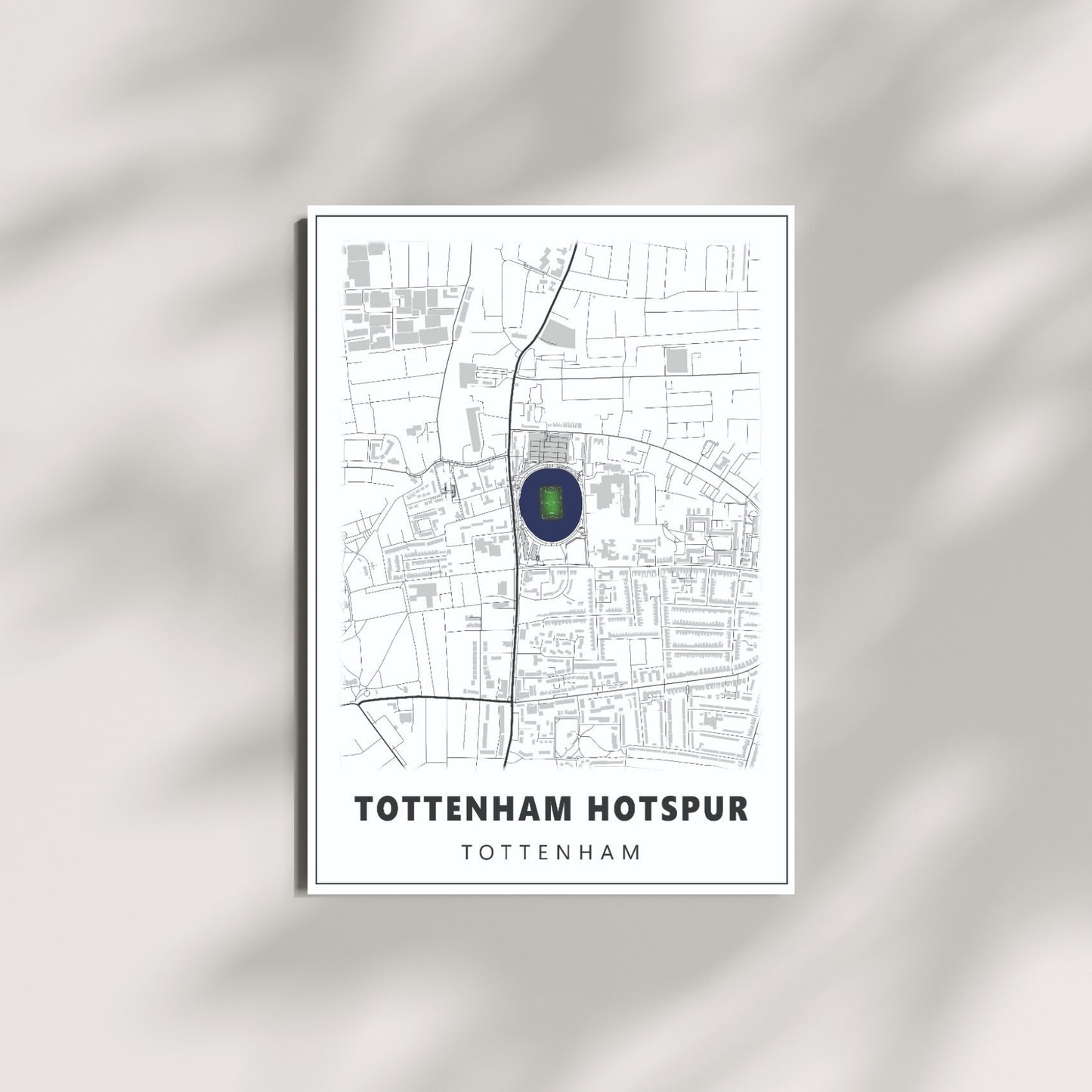 Tottenham Hotspur football wall art featuring a minimalist stadium map poster displayed on a modern neutral wall