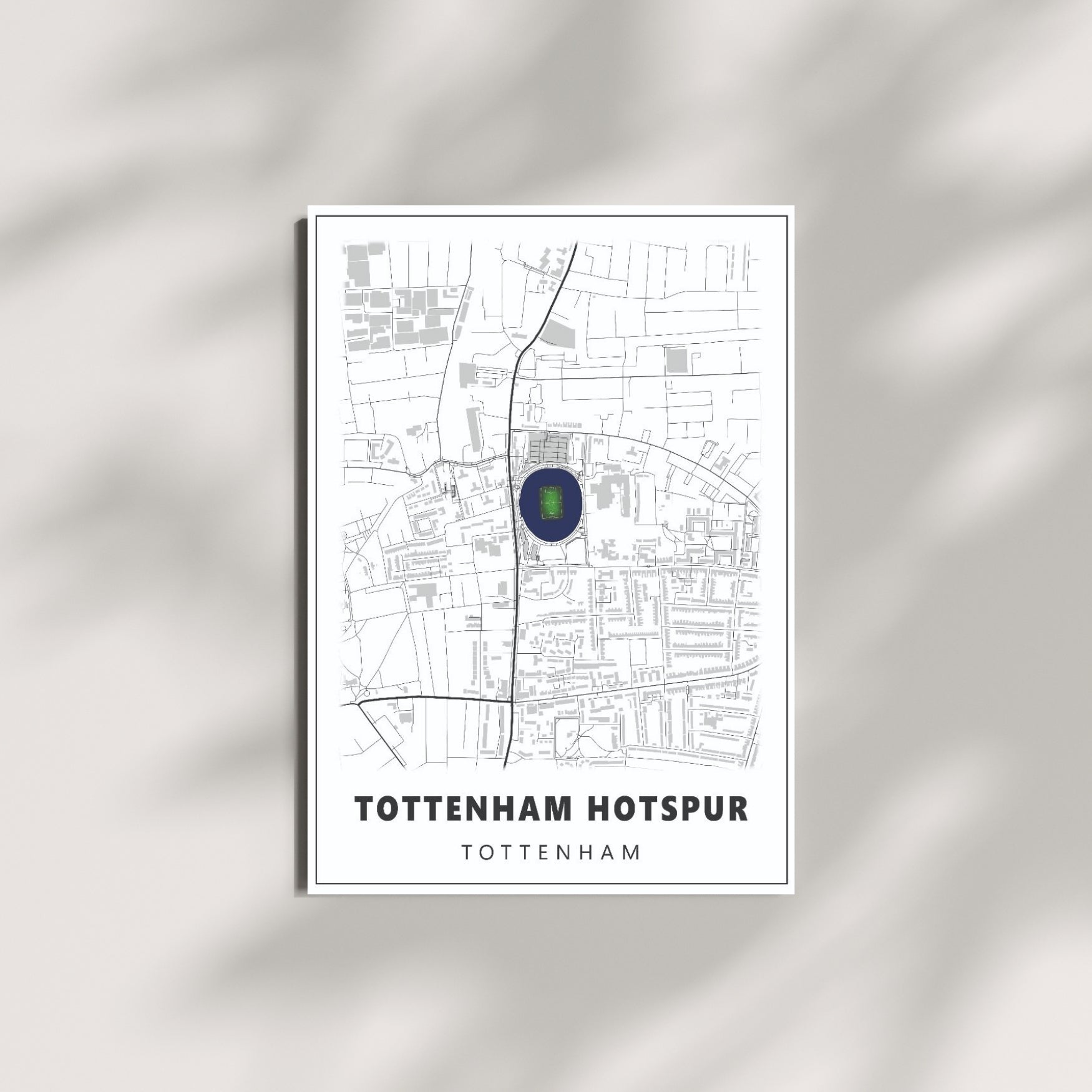 Tottenham Hotspur football wall art featuring a minimalist stadium map poster displayed on a modern neutral wall